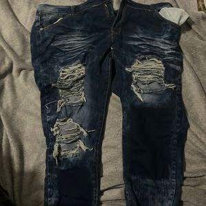 Woman’s distressed skinny jeans